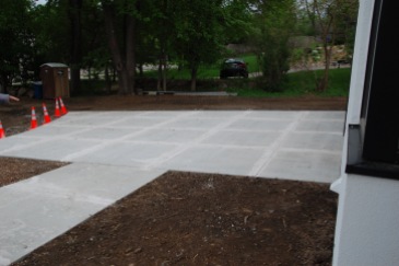Driveway and sidewalk with relief cuts
